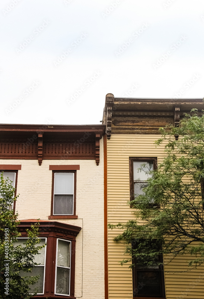 white and yellow  row house buildings