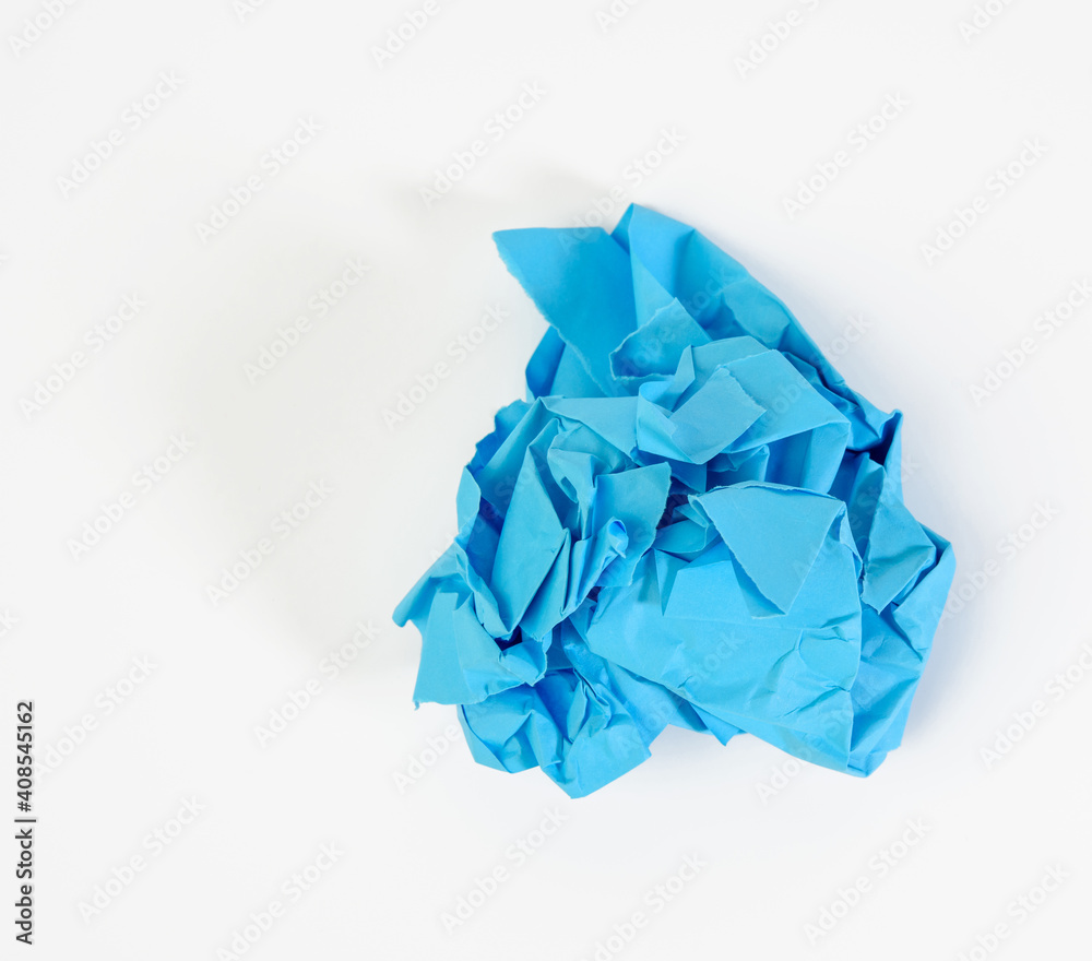 crumpled ball of blue paper on white background crumpled ball of blue paper on white background