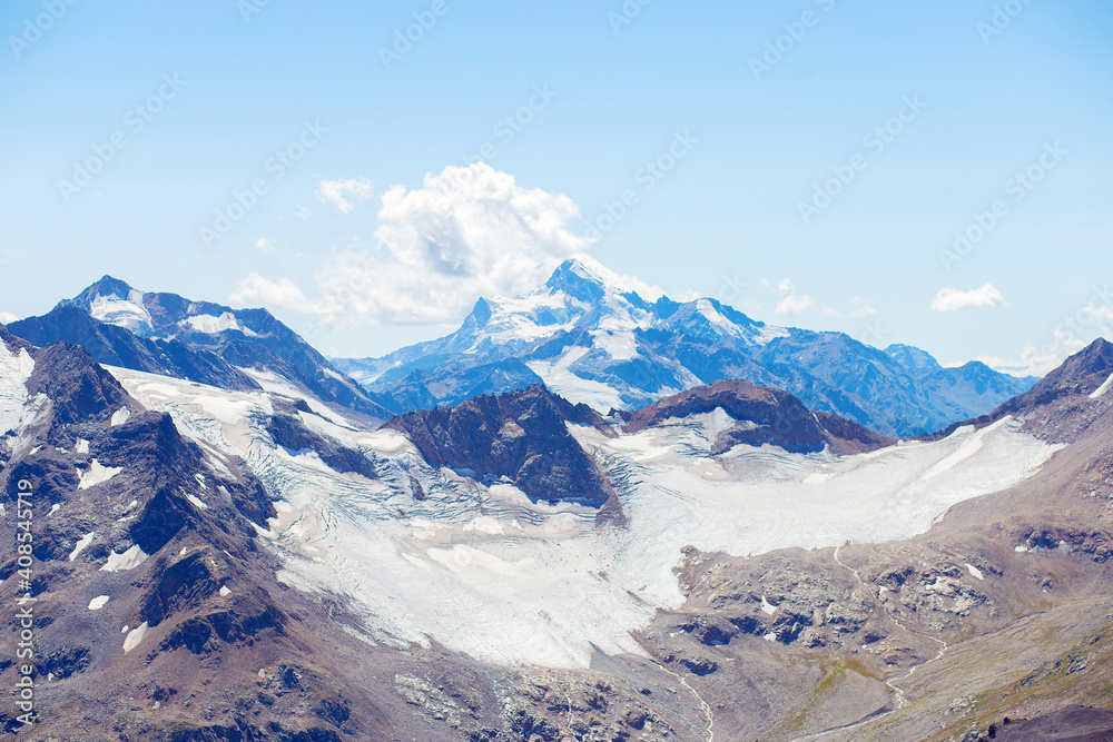 Nice view of the mountains. Caucasian ridge in summer. Mountain landscape of Elbrus