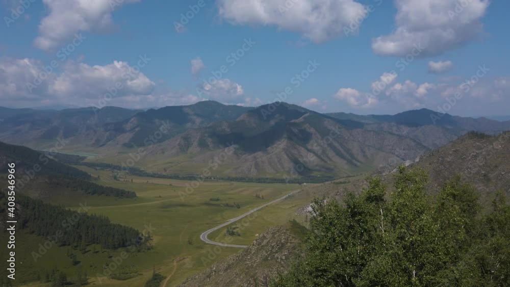 Winding road in the mountains pass Chike-taman,Altai mountains, Russia. Chuisky trakt road - one of the most beautiful road in the world Winding road in the mountains pass Chike-taman,Altai mountains, Russia. Chuisky trakt road - one of the most beautiful road in the world