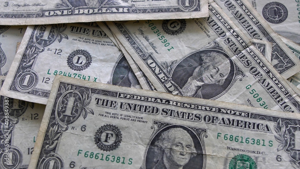 Fototapeta premium Dollar Bills Cash on a Table Close Up