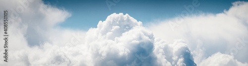 Photography Clear blue sky with glowing white cumulus clouds