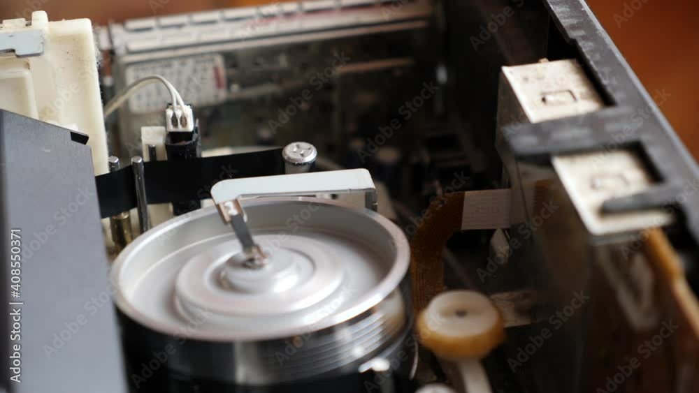 The work of the mechanics of the tape long mechanism. Rewinding the VHS tape The work of the mechanics of the tape long mechanism. Rewinding the VHS tape