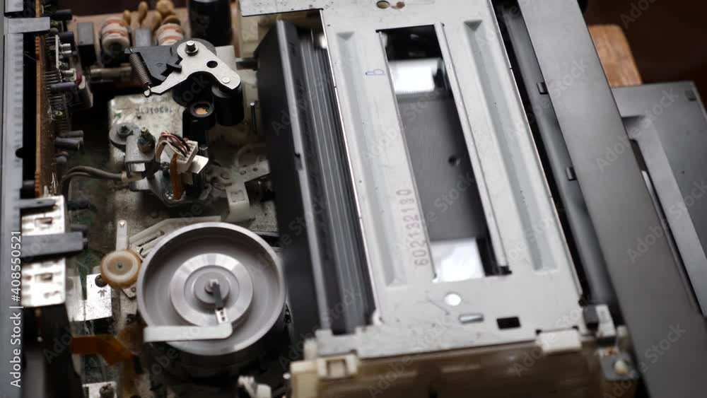 Unloading VHS cassette. Work of the tape of the extended mechanism Unloading VHS cassette. Work of the tape of the extended mechanism