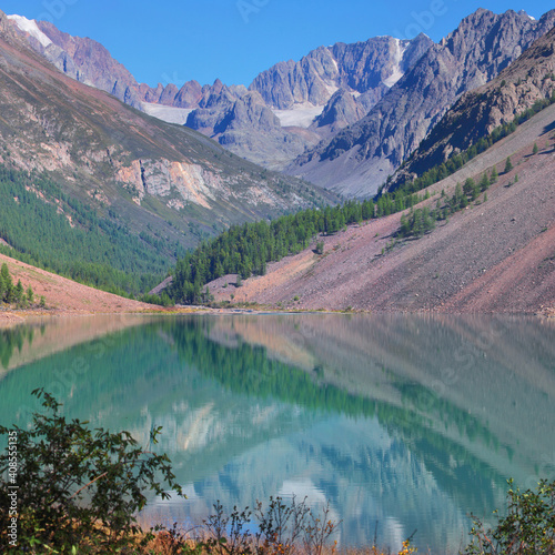 A picturesque lake in the Altai mountains. Morning view.