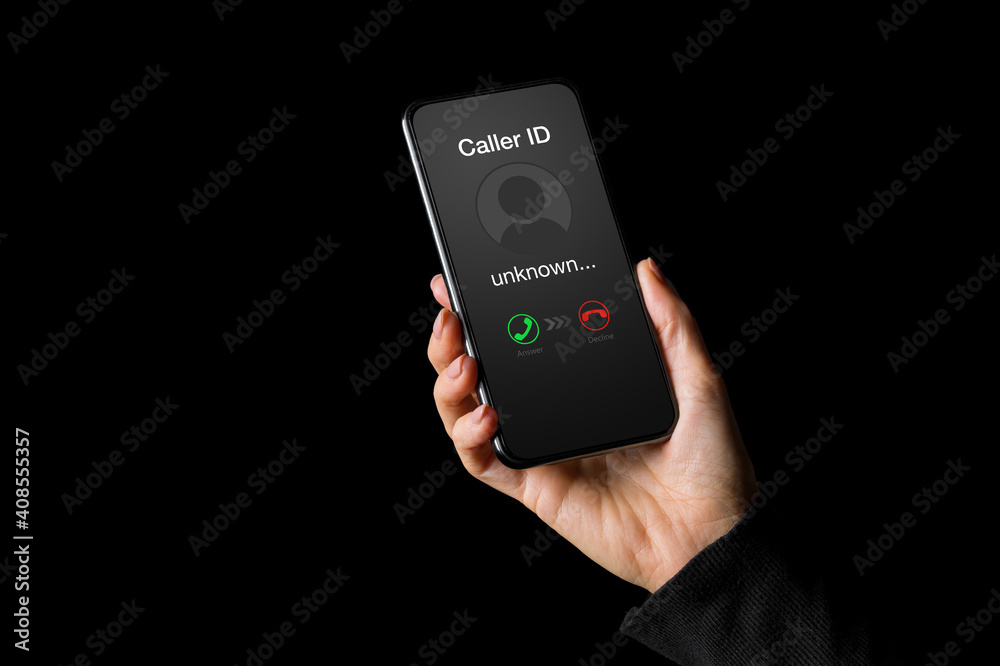 Person receiving call on phone from an unknown caller Person receiving call on phone from an unknown caller