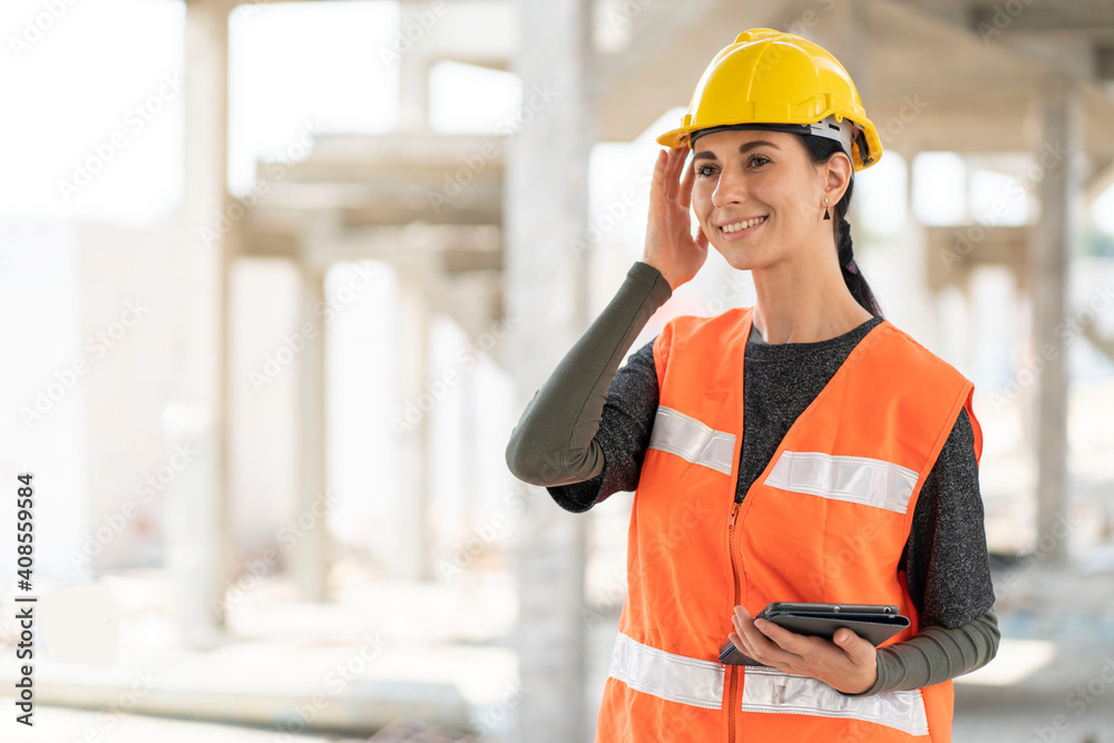 female Fromans wear protective helmets, inspect contractors and correct strength, construction work, home construction work. female Fromans wear protective helmets, inspect contractors and correct strength, construction work, home construction work.