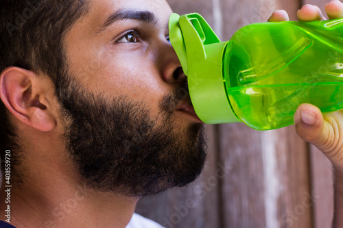 man drinking water