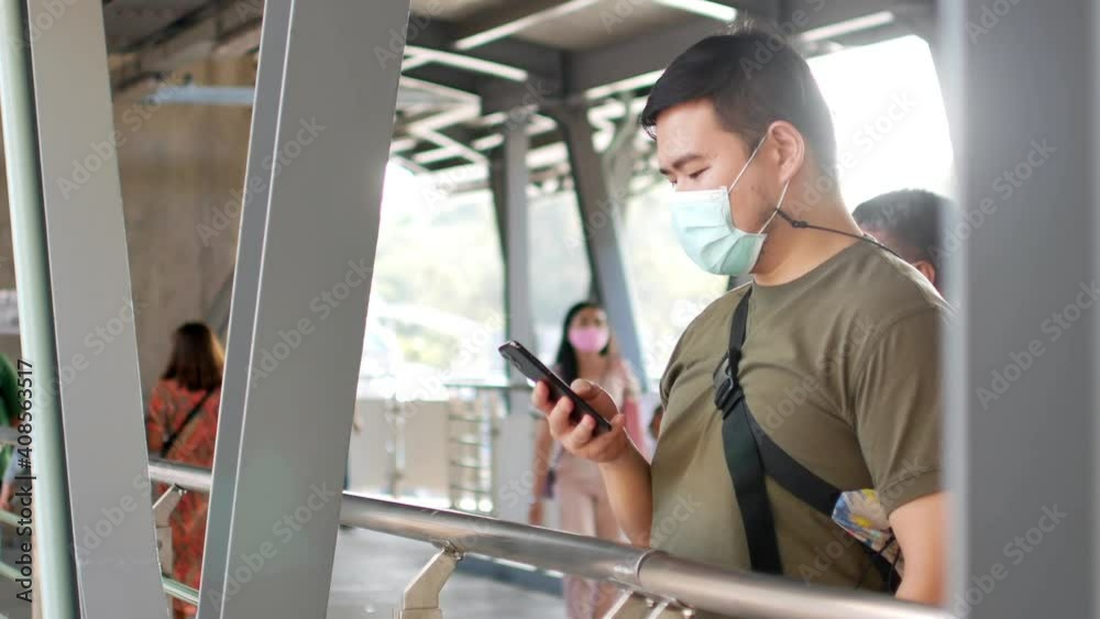 POV of a man wearing mask protect from corona virus Covid19 while using mobile phone POV of a man wearing mask protect from corona virus Covid19 while using mobile phone