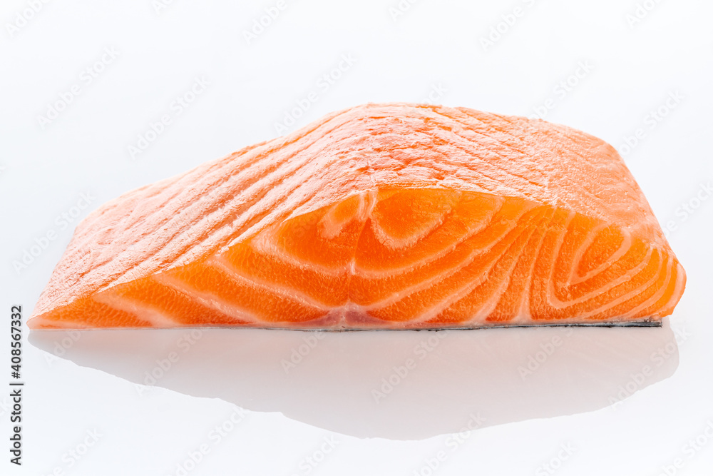 Fresh raw uncooked salmon fillet slice steak isolated on white background, side view Fresh raw uncooked salmon fillet slice steak isolated on white background, side view