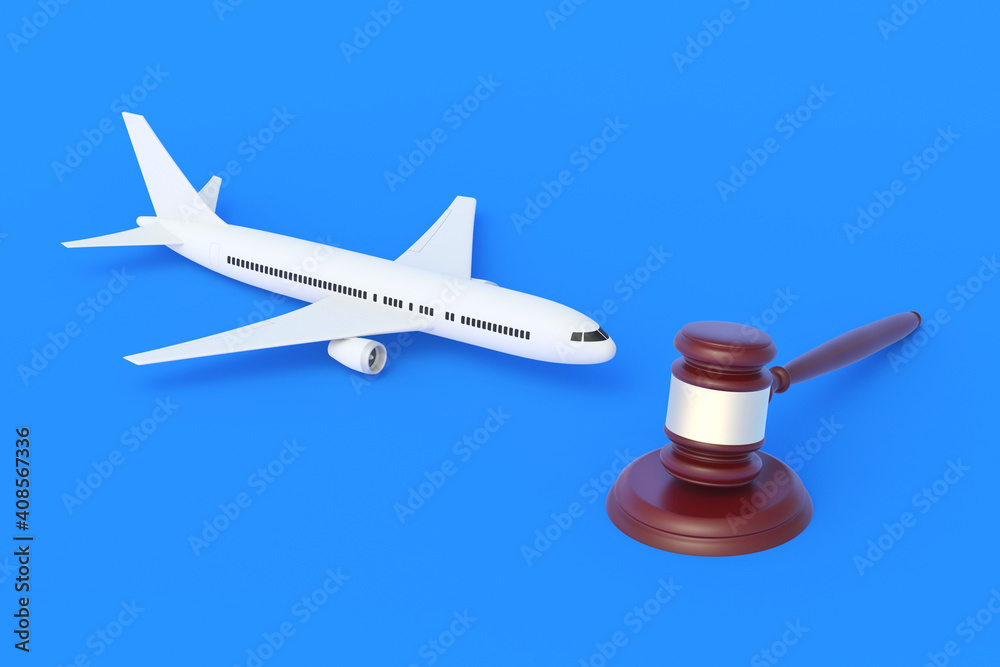Passenger plane and judge gavel. Aviation law. Insurance