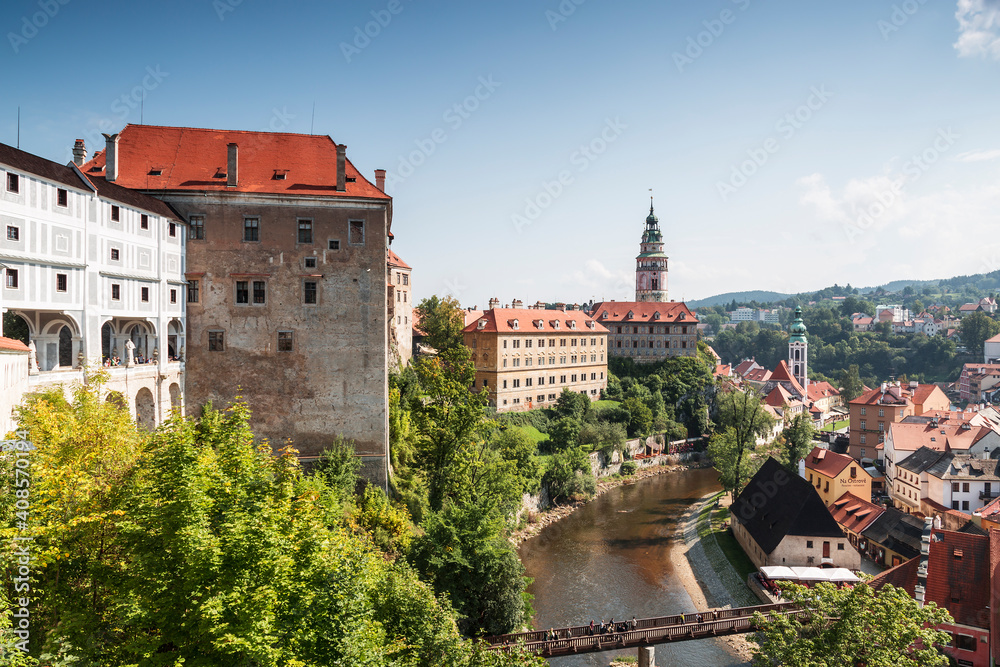View of the medieval town of Cesky Krumlov with Krumlov Castle, city blocks and the Vltava River. Czech Republic