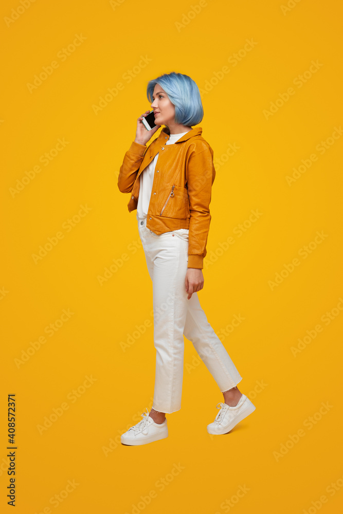 Stylish woman speaking on smartphone Stylish woman speaking on smartphone