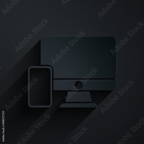 Paper cut Computer monitor and mobile phone icon isolated on black background. Earnings in the Internet, marketing. Paper art style. Vector.