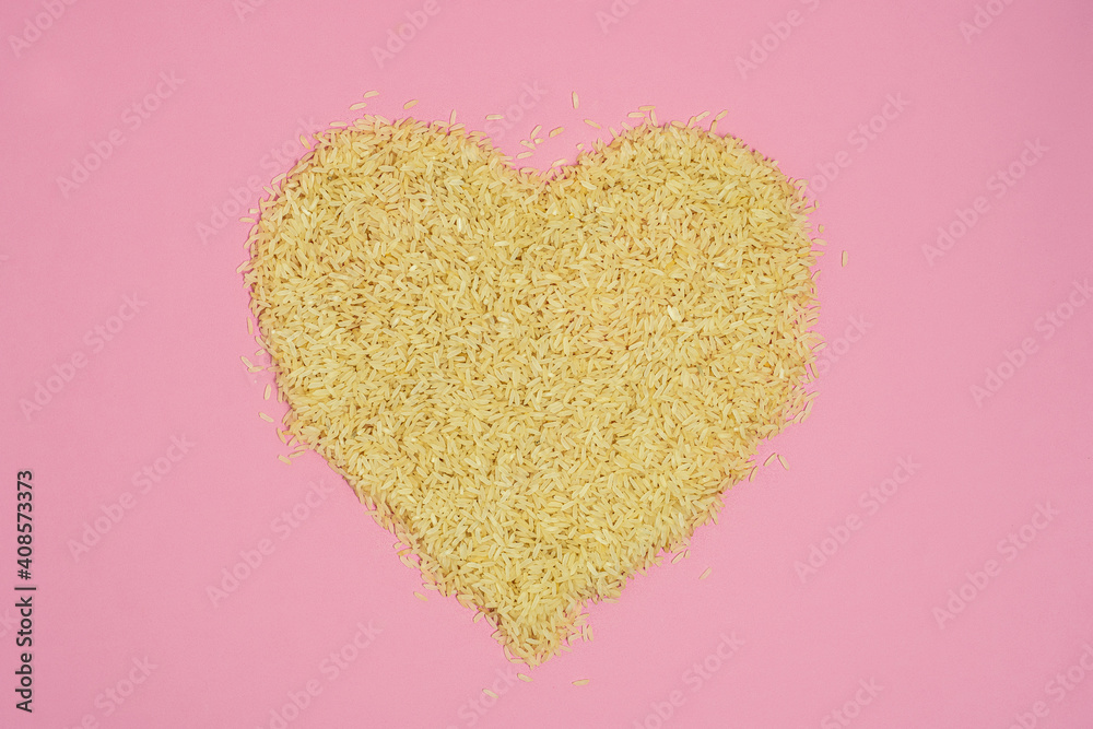 Rice heart over pink background Rice heart over pink background