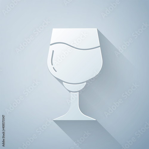 Paper cut Wine glass icon isolated on grey background. Wineglass sign. Paper art style. Vector.