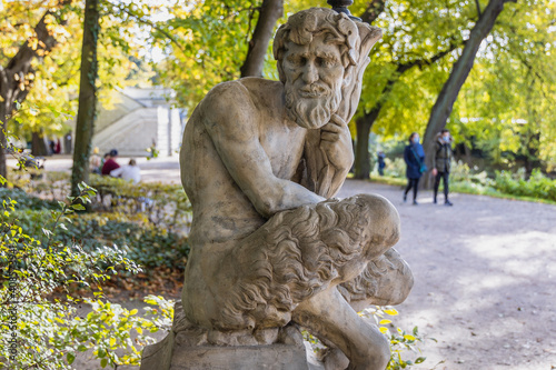Satyr sculpture in Royal Baths Park, Lazienki Park, one of the most famous parks in Warsaw, Poland