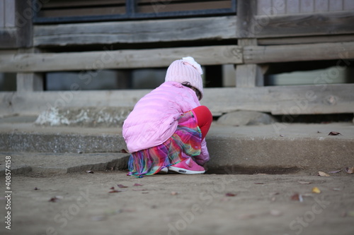 child playing in the street