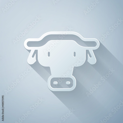 Paper cut African buffalo head icon isolated on grey background. Mascot, african savanna animal. Wild ox, carabao or bison bull with fused horns. Paper art style. Vector.