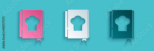 Paper cut Cookbook icon isolated on blue background. Cooking book icon. Recipe book. Fork and knife icons. Cutlery symbol. Paper art style. Vector.