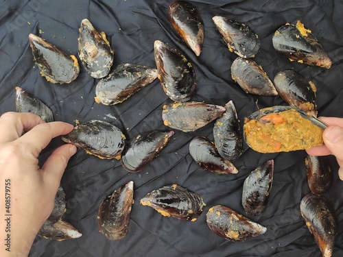 Mussels on  a black tablecloth