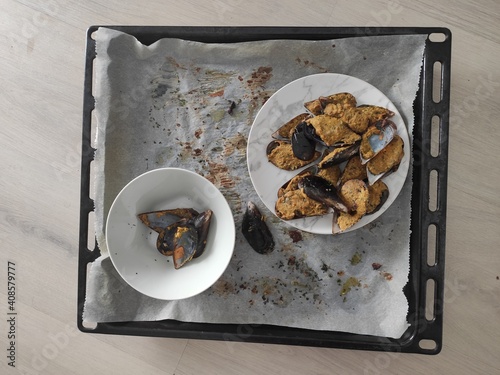 Mussels bowl on white baking paper