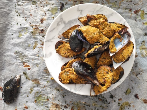 Mussels bowl on white baking paper