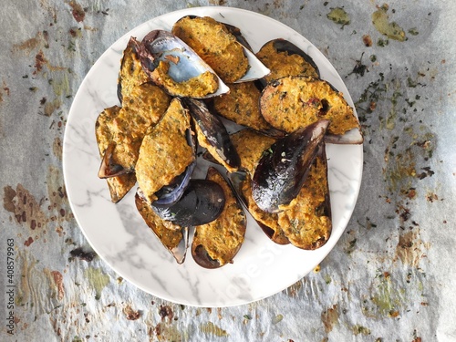 Mussels bowl on white baking paper
