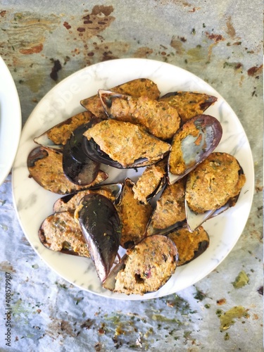 Mussels bowl on white baking paper