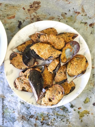 Mussels bowl on white baking paper