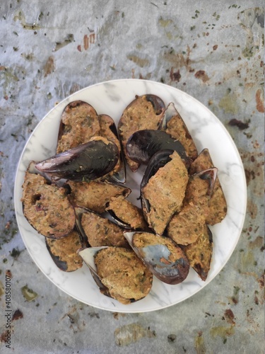 Mussels bowl on white baking paper
