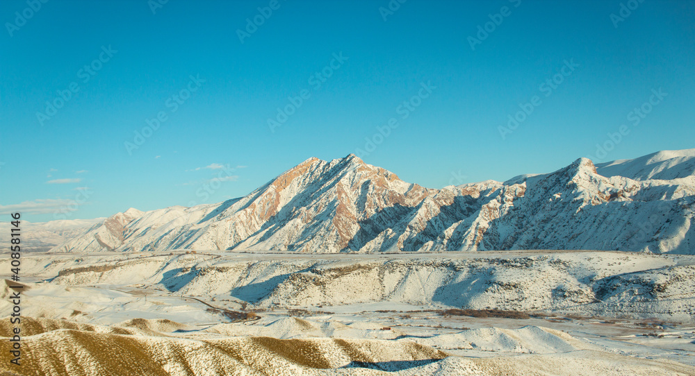 snow-white mountain during the day snow-white mountain during the day