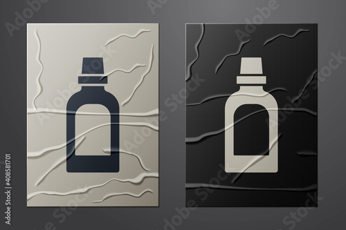 White Plastic bottle for laundry detergent, bleach, dishwashing liquid or another cleaning agent icon isolated on crumpled paper background. Paper art style. Vector.