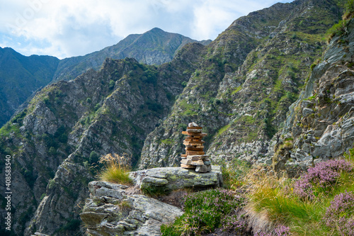Hiking in Val Grande national park. A cairn marking a wild footpath photo