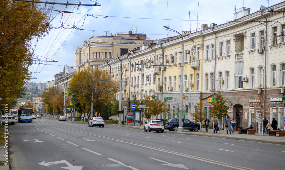  Autumn has come to the city.Pedestrians and vehicles move along the street Bolshaya Sadovaya