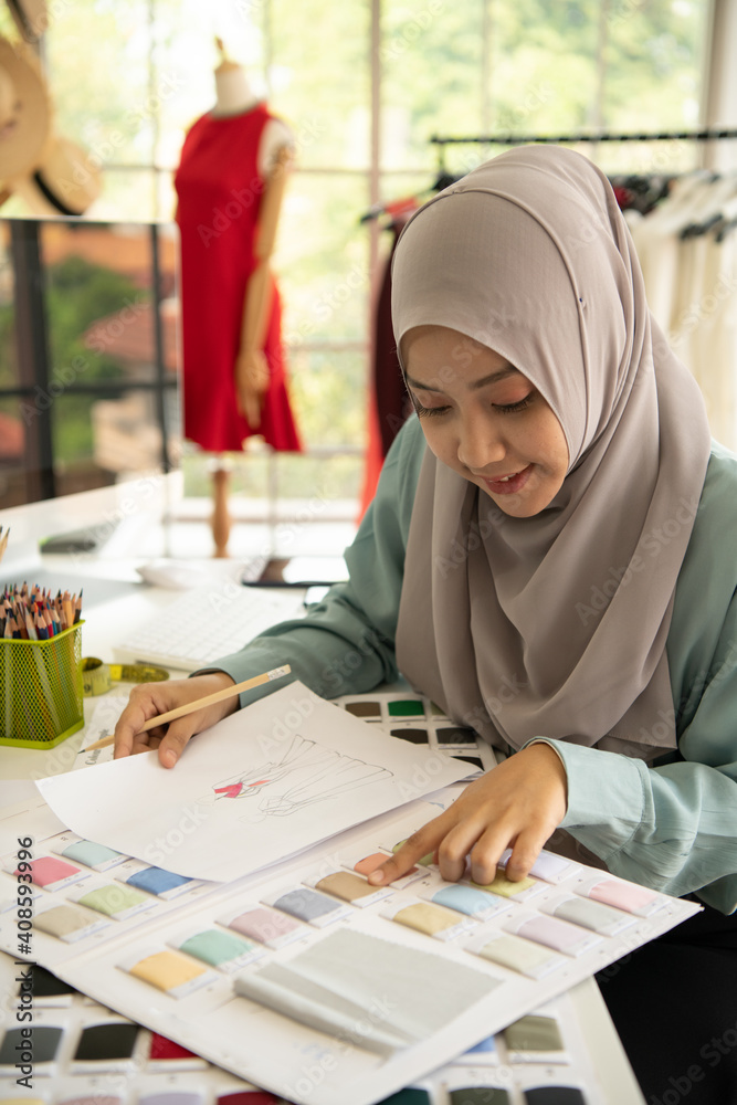 Both Muslim women run a small business in their own homes. Is the design and tailoring of clothes. Both Muslim women run a small business in their own homes. Is the design and tailoring of clothes.