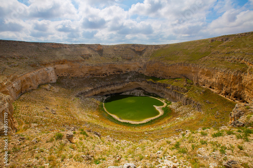 Cirali Pothole is in Akviran Plateau in the north west of Yenikent District of Konya's Karapınar district. photo