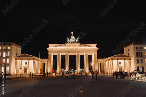 Berlin Brandenburger Tor at night with people