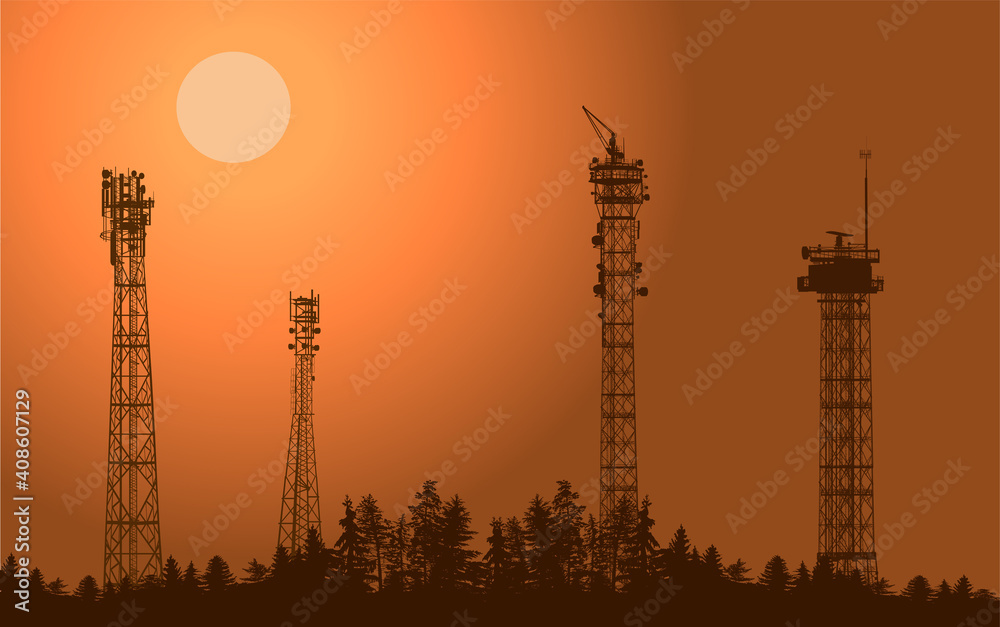 four antenna tower silhouettes in black forest at orange sky four antenna tower silhouettes in black forest at orange sky