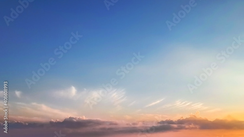 Cloudy sky at sunset. View from the airplane window. © Виталий Стамат