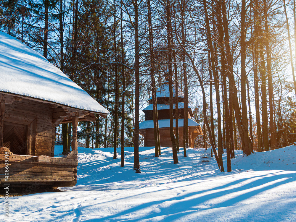Wooden vintage country house in mountains forest covered with snow on ...