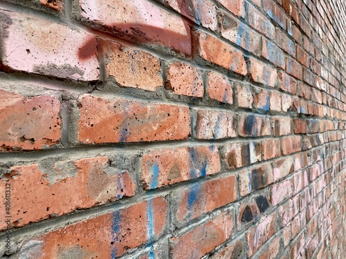 Abstract background texture. Red, orange, brown seamless pattern. Wallpaper design, grunge old surface. Brick wall