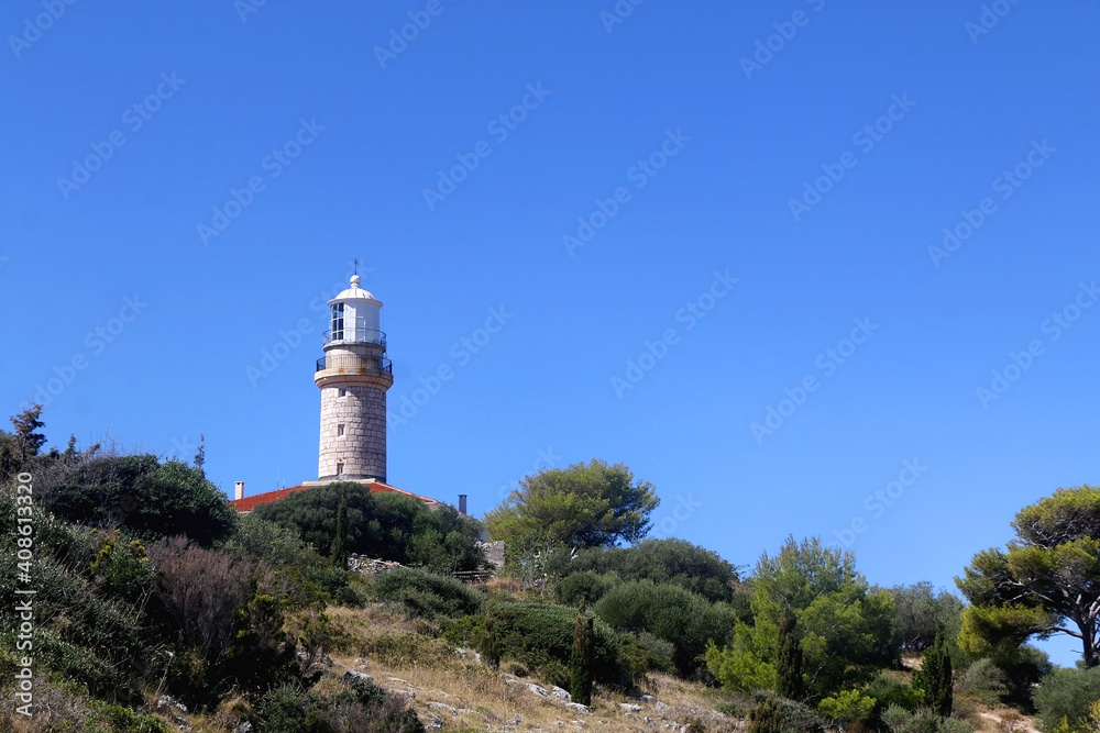 Picturesque lighthouse on the hill. Beautiful landscape on island Lastovo, Croatia.