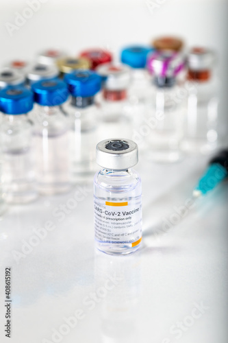 Izmir, Turkey - 01-26-2021: Sinovac Covid -19 vaccine vial and injection syringe isolated on white background.