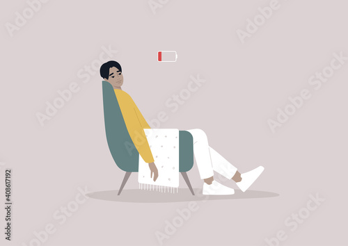 A young male Asian exhausted character sitting in a chair with a low battery indicator above