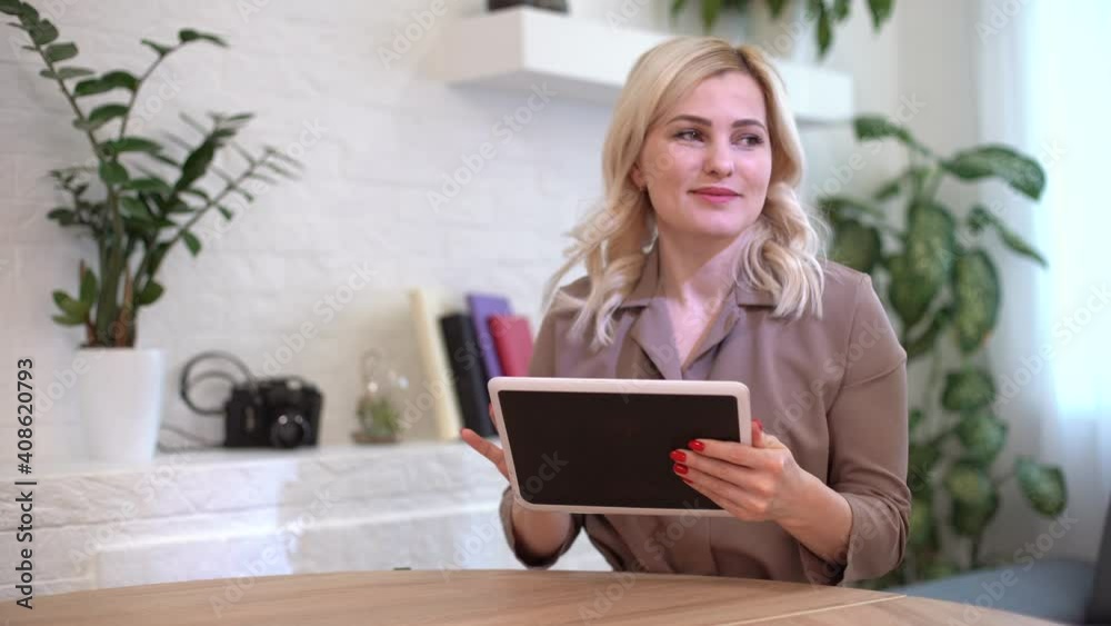 young woman using digital tablet at home young woman using digital tablet at home