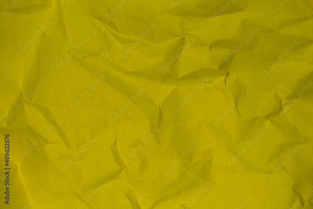 Fototapeta premium Yellow clumped paper texture background