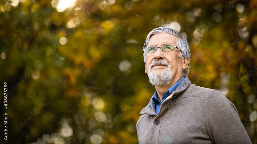 Portrait of a senior man outdoors, optimism, good health, happyness radiates of the man's face, expression Portrait of a senior man outdoors, optimism, good health, happyness radiates of the man's face, expression