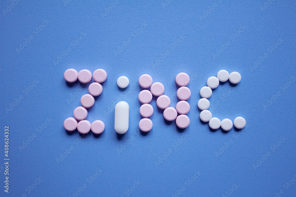 ZINC EN LETRERO DE PASTILLAS SOBRE FONDO AZUL ZINC EN LETRERO DE PASTILLAS SOBRE FONDO AZUL