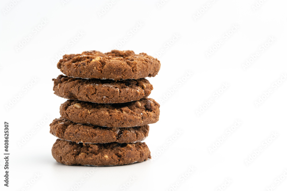Stack of homemade sweet chocolate cookies on white. Stack of homemade sweet chocolate cookies on white.